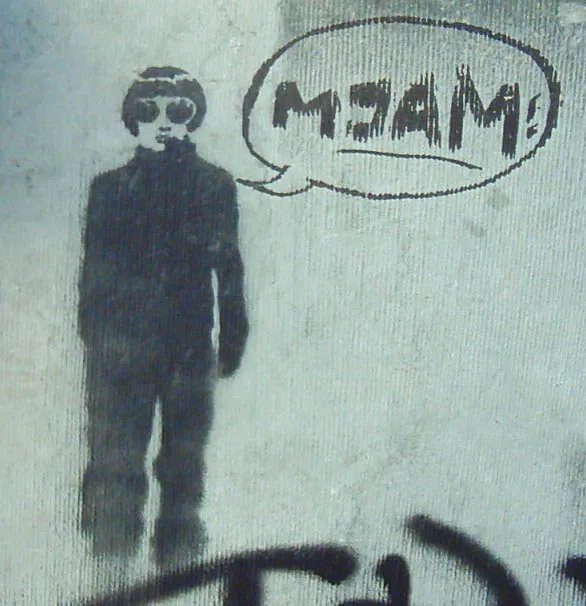 Stencil van een figuur met stofbril en muts, met een tekstballon waarin MJAM! staat